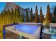 Relaxing hot tub area with mood lighting, modern design, and a peaceful ambiance for ultimate relaxation at 7165 Cordery Rd, Cumming, GA 30040
