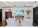 Cozy living room with an electric fireplace, shiplap wall, and comfortable seating, creates a relaxing atmosphere at 7165 Cordery Rd, Cumming, GA 30040