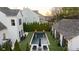 Aerial shot of an inviting backyard pool with modern design elements and outdoor seating area at 7165 Cordery Rd, Cumming, GA 30040