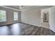 Light-filled bedroom featuring hardwood floors and neutral walls, offering a calm and inviting atmosphere at 863 Fairlong Nw Way, Acworth, GA 30101