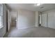 Bedroom with neutral walls, carpet, one window, and closet doors at 863 Fairlong Nw Way, Acworth, GA 30101