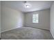 Bedroom featuring neutral walls and carpet with natural light from the window at 863 Fairlong Nw Way, Acworth, GA 30101