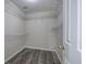 Functional walk-in closet equipped with shelves for optimal storage and organization at 863 Fairlong Nw Way, Acworth, GA 30101