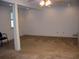 Spacious basement featuring neutral carpet and recessed lighting, perfect for recreation or storage at 219 Park Avenue, Woodstock, GA 30188