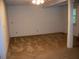 Large open basement with carpet and a column for support at 219 Park Avenue, Woodstock, GA 30188
