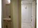 Bathroom featuring a vanity, mirror, and a second room with a door at 219 Park Avenue, Woodstock, GA 30188