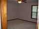 Cozy bedroom with a neutral carpet and natural light at 219 Park Avenue, Woodstock, GA 30188