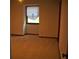 A bedroom with carpet and a window with a closed shade at 219 Park Avenue, Woodstock, GA 30188
