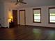 Spacious living area features hardwood floors, natural light, and ample room at 219 Park Avenue, Woodstock, GA 30188