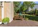 Well-maintained outdoor deck with grill, perfect for entertaining and enjoying the landscaped backyard at 4729 Woodland Brook Se Ct, Atlanta, GA 30339