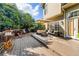 Expansive deck with outdoor seating, grilling area, and a view of the lush backyard at 4729 Woodland Brook Se Ct, Atlanta, GA 30339