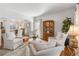Open-concept living area with elegant seating and hardwood floors at 4729 Woodland Brook Se Ct, Atlanta, GA 30339
