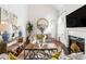 Cozy living room features a fireplace, hardwood floors, and decorative accents at 4729 Woodland Brook Se Ct, Atlanta, GA 30339