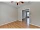 Bedroom features hardwood floors and a doorway leading to another room at 148 Crystal Downs Way, Suwanee, GA 30024
