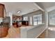 Bright kitchen with cherry cabinets, granite countertops, stainless appliances, and an island for food preparation at 148 Crystal Downs Way, Suwanee, GA 30024
