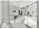 Modern bathroom showcases a freestanding tub, glass shower, and double vanity sinks with white countertops at 270 Boulder Dr, Roswell, GA 30075