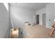 Upper level loft space exhibiting modern architectural design awaiting customization at 5210 Brownlee Rd, Stone Mountain, GA 30087