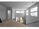 Open loft area with a view, featuring large windows and modern architectural design at 5210 Brownlee Rd, Stone Mountain, GA 30087