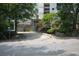 A well-paved driveway leading to a building entrance, complemented by landscaping and signage at 850 Ralph Mcgill Ne Blvd # 6, Atlanta, GA 30306