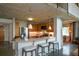Contemporary kitchen featuring a breakfast bar, stainless steel appliances, wood cabinets and a concrete ceiling at 850 Ralph Mcgill Ne Blvd # 6, Atlanta, GA 30306