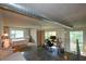 Open concept living space with a bed, computer desk, exposed duct work, and large windows at 850 Ralph Mcgill Ne Blvd # 6, Atlanta, GA 30306