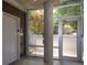 A sleek lobby area with an elevator, exterior glass doors and frosted windows creating a welcoming entrance at 850 Ralph Mcgill Ne Blvd # 6, Atlanta, GA 30306