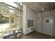 A functional mail room area with mailboxes, storage, and a view through a window to exterior scaffolding at 850 Ralph Mcgill Ne Blvd # 6, Atlanta, GA 30306