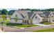 Charming exterior view of a home showcasing a well-kept lawn and inviting curb appeal at 1659 Tielman Way, Snellville, GA 30078
