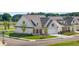 Charming single-Gathering home with attached garage, a welcoming porch, and beautiful landscaping at 1659 Tielman Way, Snellville, GA 30078