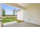 Outdoor patio with concrete slab, offering a relaxing space in the backyard at 1659 Tielman Way, Snellville, GA 30078