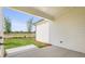 Outdoor patio with concrete slab, light siding, and lawn at 1659 Tielman Way, Snellville, GA 30078