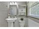 Bathroom featuring a pedestal sink, and neutral colors at 1744 Chateau Dr, Dunwoody, GA 30338