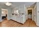 Well-maintained kitchen with white cabinets, stainless steel appliances, and a view into the dining area at 1744 Chateau Dr, Dunwoody, GA 30338