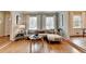 Comfortable living room featuring hardwood floors with a view into other rooms and lots of natural light at 1744 Chateau Dr, Dunwoody, GA 30338