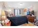 Comfortable bedroom features a large bed, dark wood furniture, and themed decor at 2127 Grant Ave, Mcdonough, GA 30252