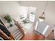 Bright foyer features soaring ceilings, elegant chandelier, and hardwood floors at 2127 Grant Ave, Mcdonough, GA 30252