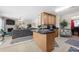 Open-concept kitchen island flows into the living area, perfect for entertaining guests at 2127 Grant Ave, Mcdonough, GA 30252