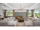Bright living area featuring stylish decor and a seamless flow to outdoor views at 248 Nesta Grove, Locust Grove, GA 30248