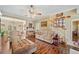 Comfortable living room showcasing hardwood floors, a staircase, and an open doorway, creating a welcoming space at 291 Miquel Jorge Ln, Canton, GA 30115