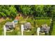 Aerial view of the property highlighting the pool, backyard, and surrounding greenery at 355 Glynnwilde Nw Dr, Marietta, GA 30064