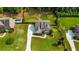 Expansive aerial view of a traditional home with a well-manicured lawn, long driveway, and inviting inground pool at 355 Glynnwilde Nw Dr, Marietta, GA 30064