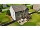 A large backyard with a privacy fence, wooden deck, and stone patio offers ample space for relaxation and entertainment at 355 Glynnwilde Nw Dr, Marietta, GA 30064