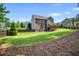 Well-maintained backyard with a deck, providing a relaxing outdoor space with privacy fence at 355 Glynnwilde Nw Dr, Marietta, GA 30064