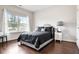 Bright bedroom with a large window, hardwood floors, and neutral decor at 355 Glynnwilde Nw Dr, Marietta, GA 30064