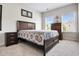 Comfortable bedroom with plush carpet, a queen-size bed, and ample natural light at 355 Glynnwilde Nw Dr, Marietta, GA 30064