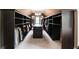 Large custom walk-in closet with ample shelving and storage space at 355 Glynnwilde Nw Dr, Marietta, GA 30064