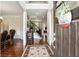 Welcoming foyer featuring hardwood floors, elegant decor, and a view of the staircase at 355 Glynnwilde Nw Dr, Marietta, GA 30064