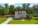 Charming two-story home with a well-manicured front yard and inviting curb appeal in a lush setting at 355 Glynnwilde Nw Dr, Marietta, GA 30064