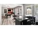 Entertaining game room with pool table, bar area, and views of the backyard at 355 Glynnwilde Nw Dr, Marietta, GA 30064