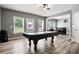 Spacious game room with a pool table and bright windows at 355 Glynnwilde Nw Dr, Marietta, GA 30064